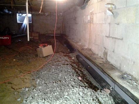 The Impact of Proper Drainage Systems on Crawl Space Moisture